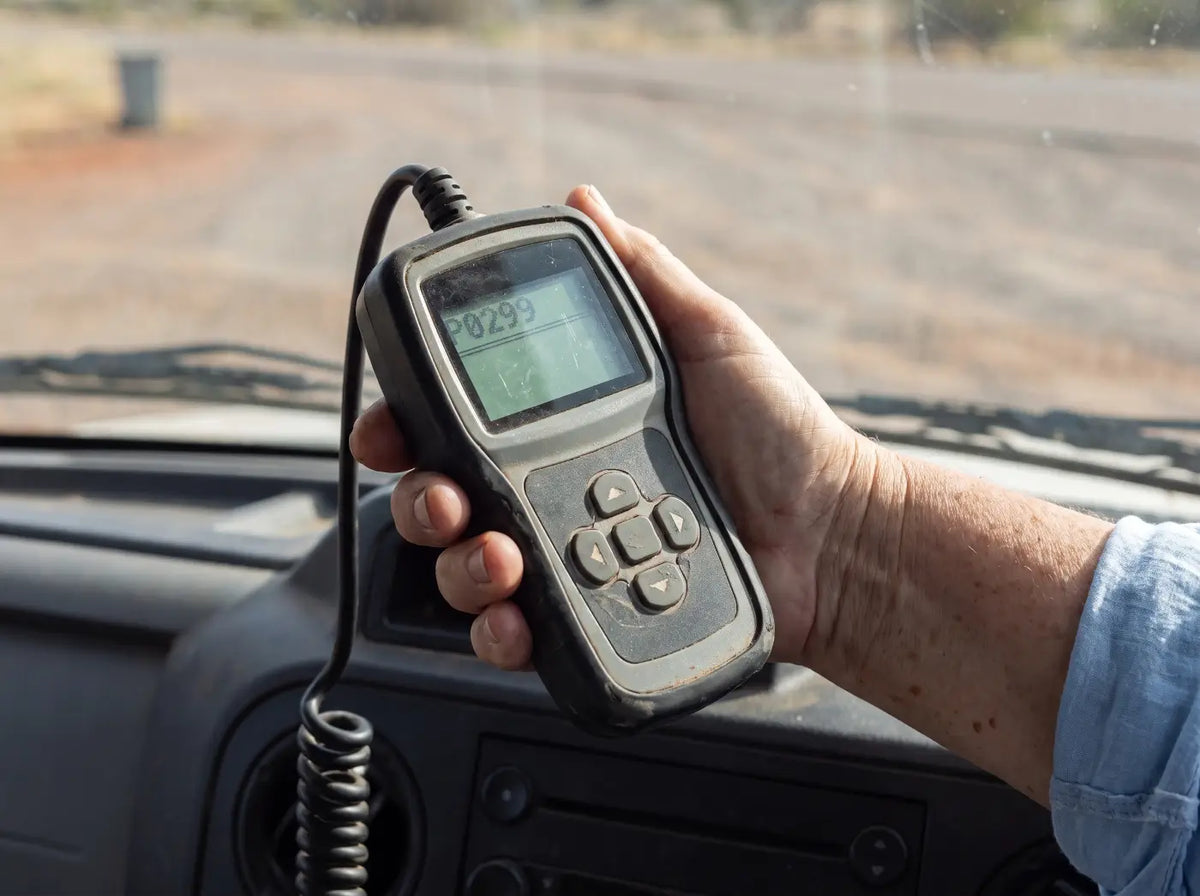 A basic code reader showing only a fault code